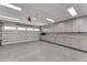 Well-organized garage with ample storage and epoxy flooring at 6517 Cay Cir, Belle Isle, FL 32809