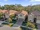 Two story house with driveway and landscaping at 8824 Bengal Ct, Kissimmee, FL 34747