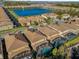 Community with lake and many houses at 8824 Bengal Ct, Kissimmee, FL 34747