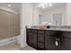 Bathroom with double vanity and shower/tub combo at 8824 Bengal Ct, Kissimmee, FL 34747