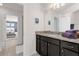 Bathroom with granite countertop and view of bedroom at 8824 Bengal Ct, Kissimmee, FL 34747