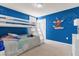 Bedroom with bunk beds and Mickey Mouse decor at 8824 Bengal Ct, Kissimmee, FL 34747