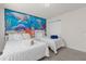 Bedroom with two twin-size beds and ocean theme at 8824 Bengal Ct, Kissimmee, FL 34747