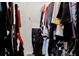 Spacious walk-in closet with clothing and accessories at 8824 Bengal Ct, Kissimmee, FL 34747