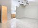 Spacious bedroom with tile flooring and ceiling fan at 936 Gillingham Ct, Kissimmee, FL 34758