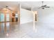 Bright living room with tile floors and a ceiling fan at 936 Gillingham Ct, Kissimmee, FL 34758