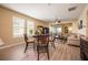 Dining area with hardwood floors and traditional furniture at 9427 Komika Ln, Winter Garden, FL 34787