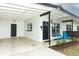 Mid-century modern home with carport, updated facade, and landscaped yard at 992 Carnation Dr, Winter Park, FL 32792