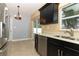 Modern kitchen features stainless steel appliances and light-colored countertops at 992 Carnation Dr, Winter Park, FL 32792