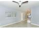 Living room with wood-look floors and a view of the backyard at 992 Carnation Dr, Winter Park, FL 32792