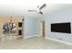 Open concept living room and kitchen area with wood-look floors at 992 Carnation Dr, Winter Park, FL 32792