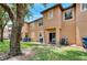 Private backyard with grass and trees at 120 Palermo St, Davenport, FL 33897