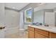 Bathroom with tub, toilet and vanity at 120 Palermo St, Davenport, FL 33897