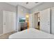 Bright bedroom with double doors and ensuite bathroom at 120 Palermo St, Davenport, FL 33897