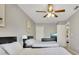 Bedroom with two beds and ceiling fan at 120 Palermo St, Davenport, FL 33897
