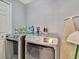 Bright laundry room with washer and dryer at 120 Palermo St, Davenport, FL 33897