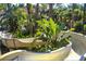 Fun water slide nestled within a lush, tropical landscape at 120 Palermo St, Davenport, FL 33897