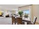 Bright dining area with table and view into living room at 1324 Hanoverian Dr, Lake Alfred, FL 33850