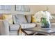Relaxing living room with gray sectional sofa and coffee table at 1324 Hanoverian Dr, Lake Alfred, FL 33850