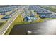 Aerial view of community pool and lake at 14025 Kauai Dr, Orlando, FL 32827
