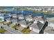 Houses near a lake, showcasing community layout at 14025 Kauai Dr, Orlando, FL 32827