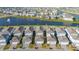 Row of houses near a lake with water fountain at 14025 Kauai Dr, Orlando, FL 32827