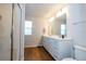 Bathroom with double vanity and walk-in shower at 14025 Kauai Dr, Orlando, FL 32827