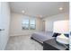 Main bedroom with large window and ensuite bathroom at 14025 Kauai Dr, Orlando, FL 32827