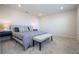 Main bedroom with king bed and bench at the foot at 14025 Kauai Dr, Orlando, FL 32827