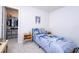 Cozy bedroom with dinosaur bedding and adjacent closet at 14025 Kauai Dr, Orlando, FL 32827