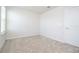 Bright bedroom with neutral walls and carpet at 14025 Kauai Dr, Orlando, FL 32827