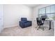 Comfortable home office with a recliner and a desk at 14025 Kauai Dr, Orlando, FL 32827