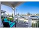 Covered porch with view of the street and lake at 14025 Kauai Dr, Orlando, FL 32827