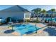 Circular spray park with umbrella shade and seating nearby at 14025 Kauai Dr, Orlando, FL 32827