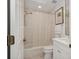 Clean bathroom with shower/tub combo, tile surround, and updated vanity at 1641 Lake Baldwin Ln, Orlando, FL 32814