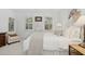 Spacious bedroom with a king-size bed, plush bedding, and ample natural light at 1641 Lake Baldwin Ln, Orlando, FL 32814