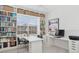 Home office features built-in bookshelves and plenty of workspace at 1641 Lake Baldwin Ln, Orlando, FL 32814