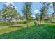 Large backyard with playset and green space at 1705 Bent Branch Ave, Deland, FL 32720