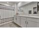 Double vanity bathroom with shower and tub at 1705 Bent Branch Ave, Deland, FL 32720