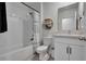 Clean bathroom with a bathtub, shower, and white vanity at 1705 Bent Branch Ave, Deland, FL 32720