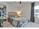 Spacious bedroom with a comfortable bed and built-in shelving at 1705 Bent Branch Ave, Deland, FL 32720