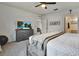 Bright bedroom with a dresser and a view into another room at 1705 Bent Branch Ave, Deland, FL 32720