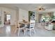 Casual dining area with a round table and chairs near the kitchen at 1705 Bent Branch Ave, Deland, FL 32720
