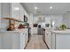 White kitchen with stainless steel appliances and ample counter space at 1705 Bent Branch Ave, Deland, FL 32720