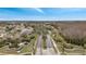 Aerial view of Brighton Lakes community, showing homes and roads at 2556 Volta Cir, Kissimmee, FL 34746