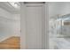 Walk-in closet and a large bathroom with marble floors and a shower at 2556 Volta Cir, Kissimmee, FL 34746
