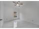 Bright bedroom with large window and ceiling fan at 2556 Volta Cir, Kissimmee, FL 34746