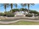 Brighton Lakes community entrance with stonework and landscaping at 2556 Volta Cir, Kissimmee, FL 34746