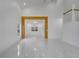 Spacious living area with a large window and marble floors at 2556 Volta Cir, Kissimmee, FL 34746
