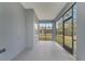 Screened porch with backyard view and additional window for light at 2556 Volta Cir, Kissimmee, FL 34746
